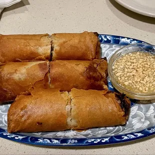 Special Egg Rolls - sooooo good. Deep-fried and filled with pork, thin clear noodles, carrots, and onions.