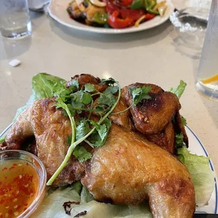 Kaiyaang (lemongrass marinated chicken).