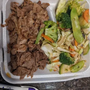 Beef and pork teriyaki with stir fry veggies. Salad is not shown