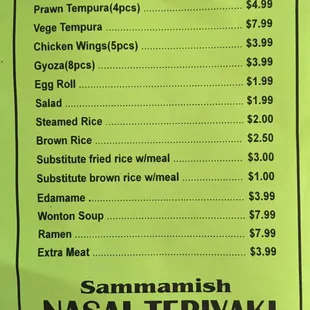 The green paper menu is their current menu with the correct prices.