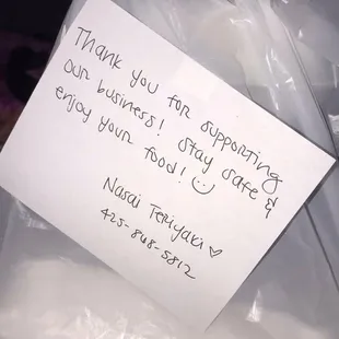 a thank card in a plastic bag