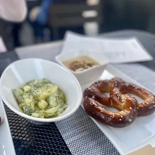 Potato salad and pretzel work beer-cheese