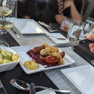 trio of sausages with German potato salad