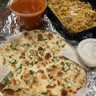 Garlic Naan, Lamb Biryani, Butter Chicken, Basmati Rice