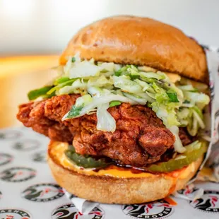 a fried chicken sandwich on a bun