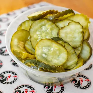 a bowl of pickled cucumbers