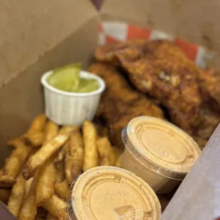a box of fried chicken and fries