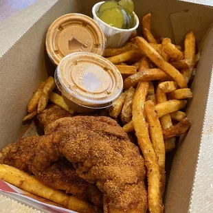 Mini-coop large tenders, fries tasted like they are cut in-house but not sure. Sauce balances the spicy