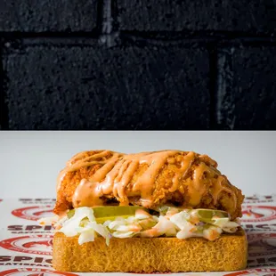 a sandwich on a piece of bread