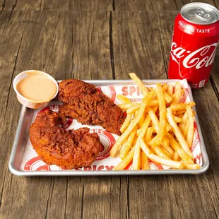 a tray of fries and a coke