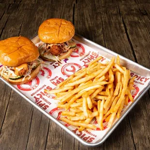 two sandwiches and french fries