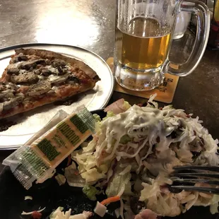 Lunch special - slice and salad (and beer). Good deal for the basics.