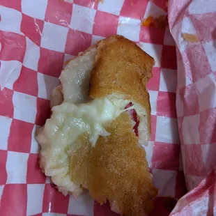 Saddest empanada ever. That goo is partly cheese, partly undercooked dough.