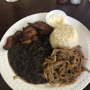 Pabellon. This slow cooked, well seasoned beef is delicious. The beans and rice were prepared perfectly and the plantains were amazing!