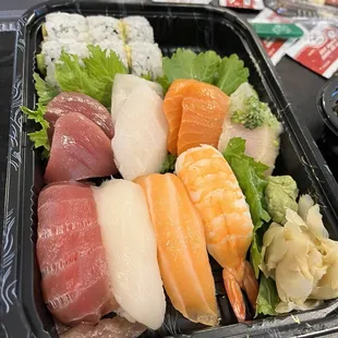 Sushi sashimi combo with volcano roll