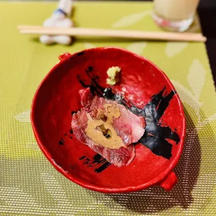 Seared A5 Japanese wagyu short rib from Kagoshima Prefecture, served with truffle-infused shoyu and wasabi