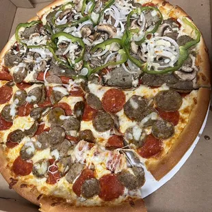 a pepperoni, sausage, and pepperoni pizza