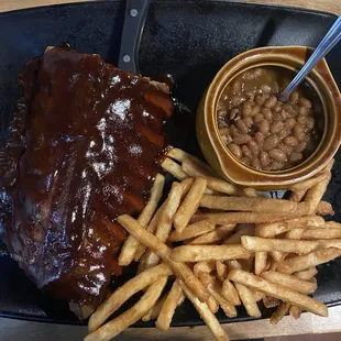 1/2 rack of ribs with baked beans and fries