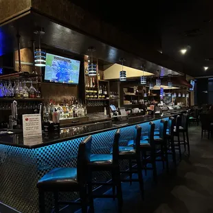 a bar with blue lights