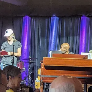 the band performing on stage