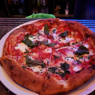 Build your own pizza. Just cheese.