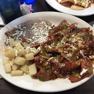Chilaquiles mexicanos, (loaded with salsa on top. Sorry, forgot to take pic before I loaded it with salsa.)
