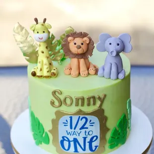 Safari themed cake with edible fondant figurines