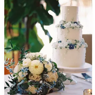 a wedding cake and flowers