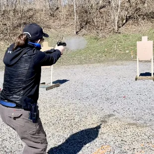 Shooting outdoors allows for movement and multiple target engagement.