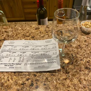 a menu and wine glasses