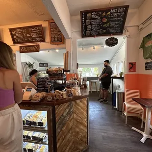 a woman standing at the counter