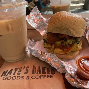 Super Bun with tomato and veggie frittata on wheat. Small iced oat milk hazelnut latte.