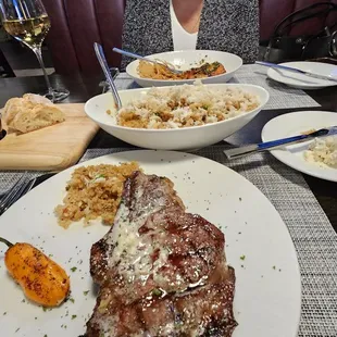 Dry aged ribeye, crab fried rice, salmon