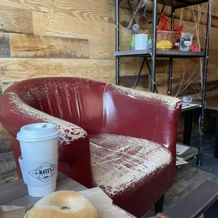 a doughnut and a cup of coffee