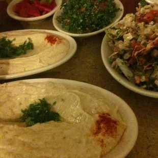 Tabbouleh, hummus, baba, and fattoush