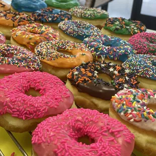 Fresh colorful sprinkle donuts!