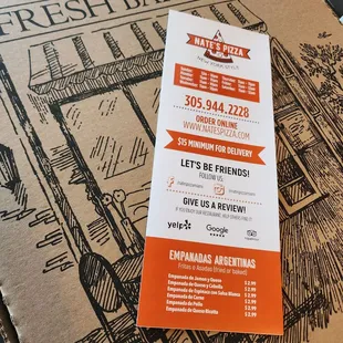 a menu for a fresh baked pizza