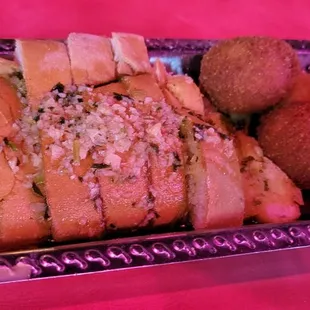 Garlic bread and hush puppies