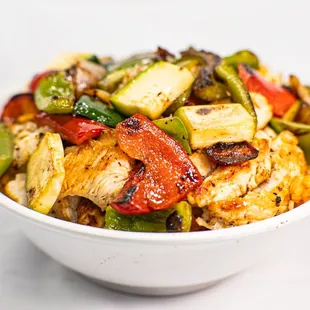 Grilled Chicken with Mixed Vegetables over Spanish Rice.