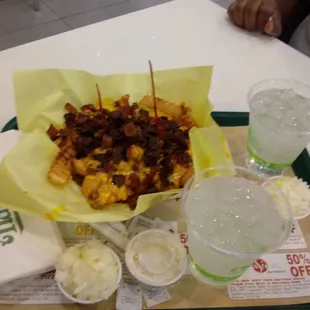 Lg chili cheese fries with bacon and sides of ranch and onion