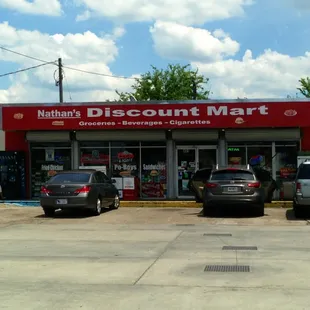 cars parked in front of the store