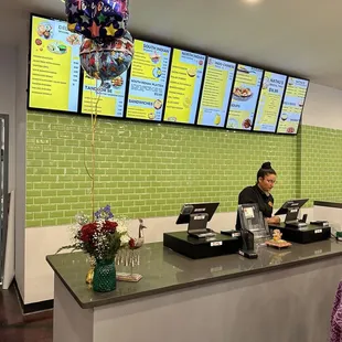 a woman sitting at the counter