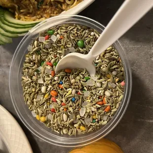 a bowl of food with a spoon