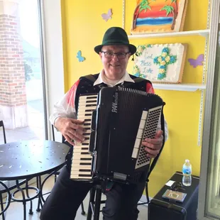 a man playing an accordion