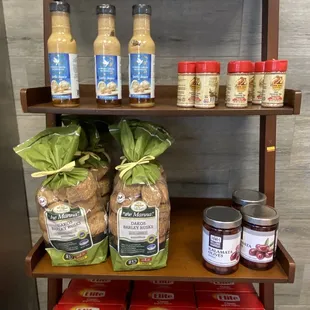 a shelf of food and condiments
