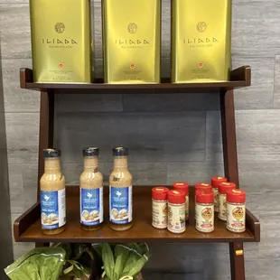 a shelf of food and condiments
