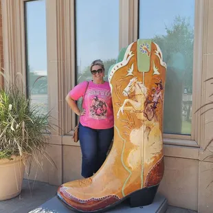 Outside to the left of the front door