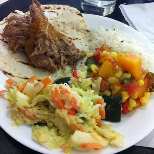 My lunch today. Pulled pork, veggies, rice and tortilla. With tax $7.05