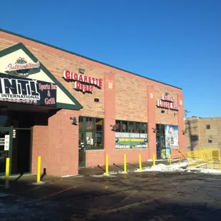 You actually walk in to the Cigarette Depot to get into the liquor store... Watch out for &quot;Club International&quot;