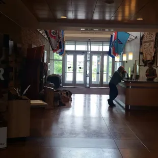 Welcome area and displays on wall inside the entrance.